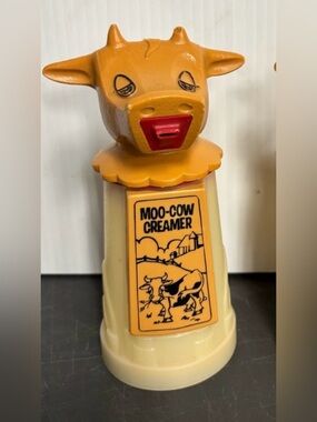 Vintage Moo-Cow creamers dispenser plastic